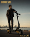 A man wearing sunglasses and a black jacket stands beside a black and gold electric scooter on a waterfront path at sunset. The text 'BOND S10' appears in the top left, and 'ROLEY X' is shown in the bottom right.