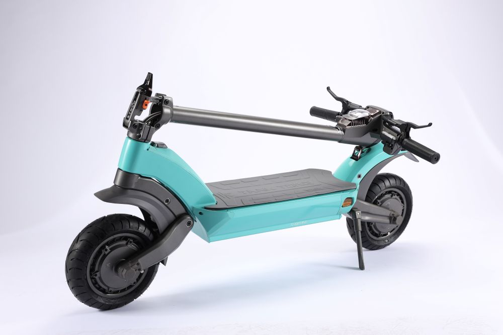 Turquoise E Twow TK5  electric scooter electric scooter with black accents on a white background