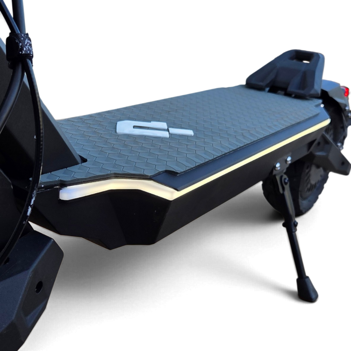 Electric Scooter Shop Punk Roamer electric scooter deck with textured grip mat, integrated LED lighting, and kickstand